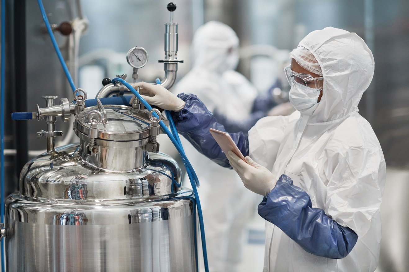 Woman Operating Pharmaceutical Production